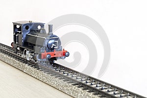 Steam locomotive model, Steam locomotive model and a train track cut out
