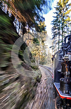 Steam locomotive ride in a curve. Dynamics through motion blur