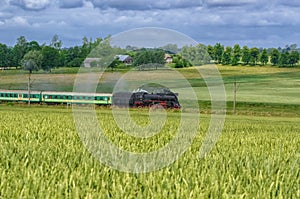 STEAM LOCOMOTIVE ON THE TRACK