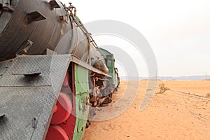 Steam locomotive and train wagons at Hejaz railway station near Wadi Rum, Jordan