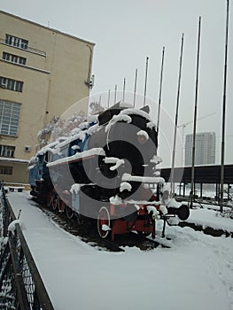 Steam locomotive under the snow