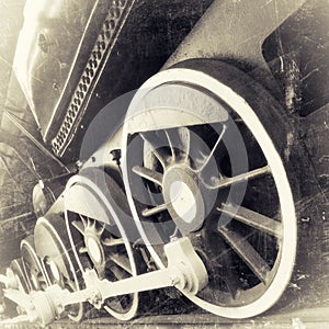 Steam locomotive wheels close up in retro black an