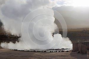 Steam of one of the beautiful El Tatio geysers at sunrise, Chile.