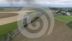 Steam Passenger Train Puffing Smoke in amish Countryside 13