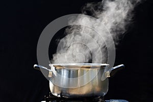 Steam on pot in kitchen