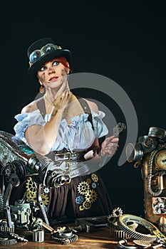 Steam-punk girl portrait on dark background