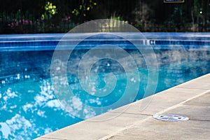 Steam Rising from Heated Swimming Pool