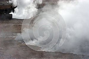 Steam rising from hot spring, geyser valley, Chile