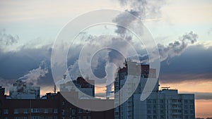 Steam rising from pipes on residential buildings