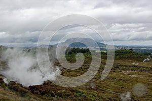 Steam rising from vent in thermal landscape, Taupo, New Zealand