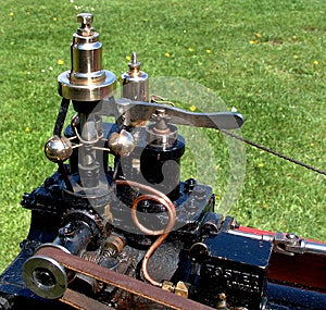 Steam safety control gear on scale model steam powered traction engine.