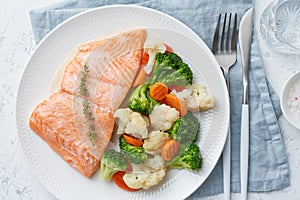 Steam salmon and vegetables, Paleo, keto, fodmap, dash diet. Mediterranean food with fish