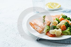 Steam salmon and vegetables, Paleo, keto, fodmap, dash diet. Mediterranean food with fish