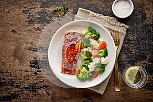 Steam salmon and vegetables, Paleo, keto, fodmap, dash diet. Mediterranean food with steamed fish.