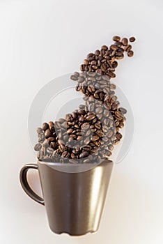 Steam shaped coffee beans and mug