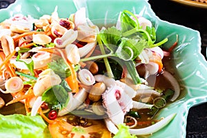 steam squid eggs salad with spicy lemon juice soup, samui thailand