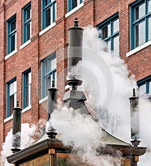 Steam street clock doing the noon chime in Vancouver, Canada