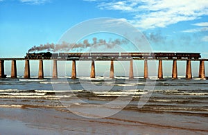 Steam train crossing Kaaimans River bridge South Africa