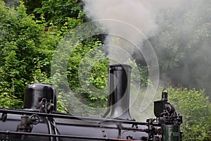 Steam train engine, upper part with the front chimney