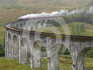 Steam train on Glenfinnan viaduct.