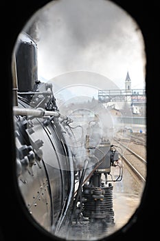 Steam train on railroad treno a vapore photo
