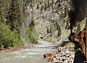 Steam train by river