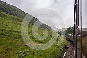 Steam train running between Fort William and Mallaig via Glenfinnan, Scotland, England