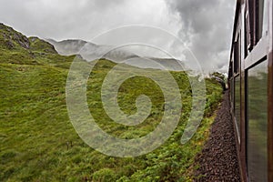 Steam train running between Fort William and Mallaig via Glenfinnan, Scotland, England