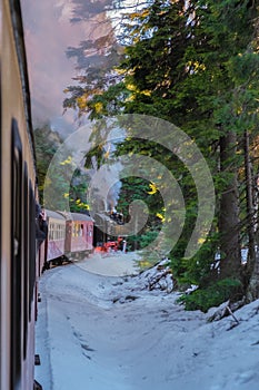 Steam train during winter in the snow in the Harz Germany Brocken Bahn