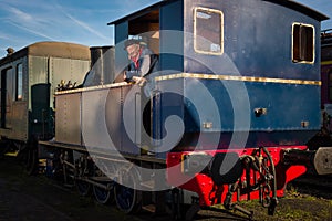 Steam train worker on antique train