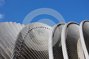 Steam turbine of nuclear power plant against a blue sky