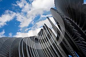 Steam turbine of nuclear power plant against sky