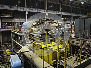 Steam turbine during repair, machinery, pipes, tubes at a power