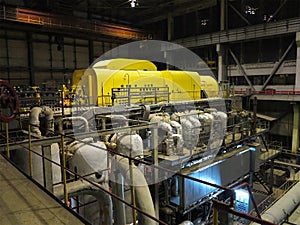 Steam turbine during repair, machinery, pipes, tubes at a power