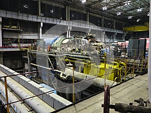 Steam turbine during repair, machinery, pipes, tubes at a power