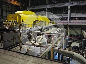 Steam turbine during repair, machinery, pipes, tubes at a power