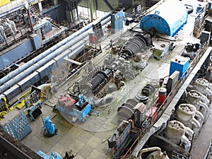 Steam turbine in repair process, machinery, pipes, tubes, at pow