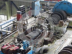 Steam turbine in repair process, machinery, pipes, tubes, at pow