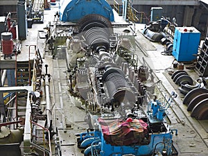 Steam turbine in repair process, machinery, pipes, tubes, at pow