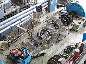 Steam turbine in repair process, machinery, pipes, tubes, at pow