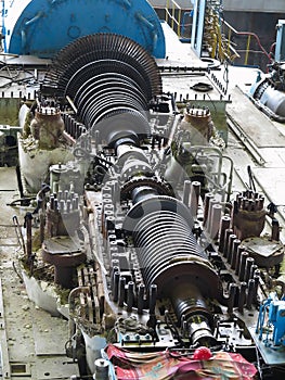 Steam turbine in repair process, machinery, pipes, tubes, at pow