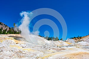Steam vapor cloud rising from an open pool at Bumpass Hell hydrothermal area at Lassen Volcanic National Park
