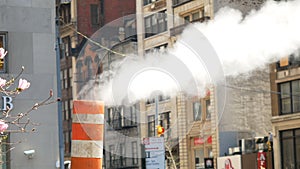 Steam venting from the street New York City Manahattan