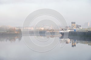 Steamboat moored on the River Clyde and construction activity in background