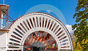 Steamboat Red Paddle Wheel. Closeup Of Red Paddle Wheel On River Boat