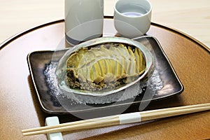 Steamed abalone with sake, japanese cuisine