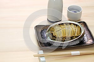 Steamed abalone with sake, japanese cuisine