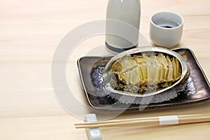 Steamed abalone with sake, japanese cuisine photo