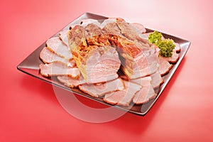 Steamed bacon on a plate photo