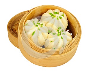 Steamed bao buns in bamboo steamers